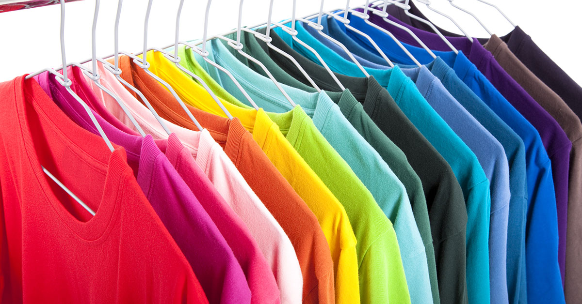 Variety of casual shirts on hangers